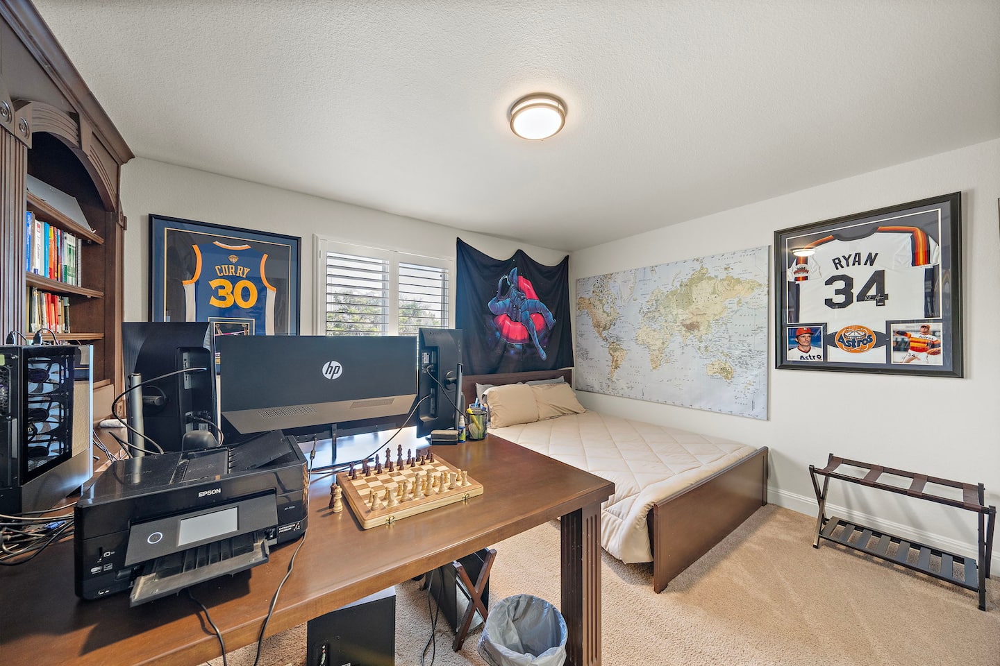 Dedicated workspace with computer monitors and printer